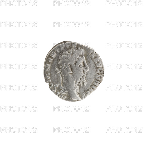 Denarius of Commodus (reign 177–192 CE). Obverse: Head of Commodus in a laurel wreath facing right, inscription M COMM ANT PF - EL AVG BRIT PP. Reverse: Minerva standing left, holding Victoria in her right hand and a spear in her left, a round shield at left and a trophy at right, inscription MIN VICT PM, RP XIIII - COS V DES VI. Roman Empire, 189 CE. Coin; diameter 16.5 mm, weight 2.50 g, axis 0°.