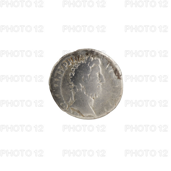 Denarius of Commodus (reigned 177–192). Obverse: Head of Commodus in a laurel wreath to the right, legend COMM ANT P FEL - AVG BRIT PP. Reverse: Roma seated on a shield to the left, holding Victoria in her outstretched right hand and a spear in her left, legend ROM FEL, XVI COS VI. Date: 190–191. Materials/typology: Roman silver coin. Diameter 16.5–17.5 mm, weight 2.48 g, axis 0°. Subjects/iconography: Roman deities; Roma; Victoria; spears; shields; Commodus iconography.