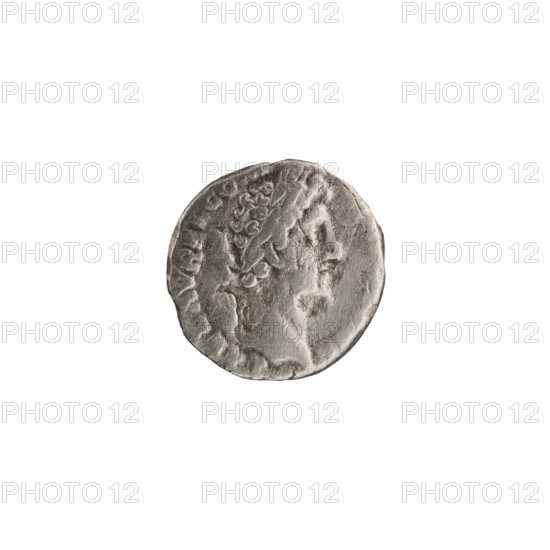 Denarius, Commodus (161–192 CE; Roman emperor 177–192), obverse: head of Commodus with a laurel wreath facing right, inscription L AEL AVREL CO, all around; reverse: two standing figures — on the left, the personification of Africa (Alexandria) wearing an elephant scalp and holding a sistrum, with a lion at its feet, giving ears of corn to Hercules-Commodus on the right, who stands with one foot on the prow of a ship and rests his club on a rock, inscription PROVIDENTIAE • AVG all around; date: 191–192 CE; Roman Empire; Rome; coin; diameter 15.5–16.0 mm; weight 2.30 g; axis 180°.