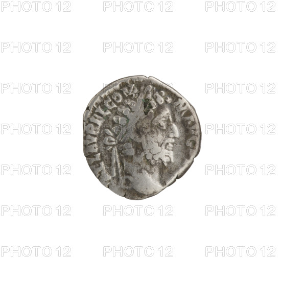 Denarius of Commodus (reigned 177–192). Obverse: Head of Commodus in laurel wreath facing right, inscription AEL AVREL COM - M AVG. Reverse: Pietas seated left, holding a scepter in her left hand and reaching her right hand toward a child standing before her; a star under the seat; inscription P M TR P XVII I - IMP VIII COS VII PP. Date: 192. Roman Empire; Rome. Coin. Diameter 17.0–17.5 mm; weight 3.05 g; axis 180°.