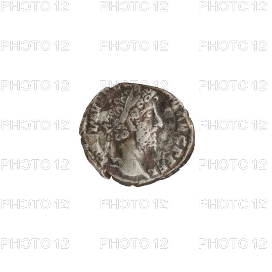 Denarius of Commodus (161–192; Roman emperor 177–192). Obverse: Head of Commodus in a laurel wreath facing right, inscription L AEL AVRE M AVG P FEL. Reverse: Victoria walking left, holding a wreath in her outstretched right hand and a palm branch in her left hand; a star in the left field, inscriptions P M, RPX, - III COS VII PP. Date: 192. Roman Empire. Coin. Diameter 15.0–17.0 mm, weight 2.15 g, axis 0°.