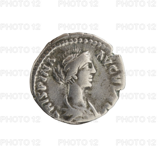 Denarius of Crispina (164–192?, Roman empress 178–192) issued under Commodus (161–192, Roman emperor 177–192). Obverse: draped bust of Crispina facing right, inscription 'CRISPINA - AVGV' with an A around. Reverse: Juno standing left, holding a long scepter in her left hand and a patera in her right, a peacock below, inscription 'I - V - NO' circumferential. Dated 178–183, Rome, Roman Empire (27 BC–476). Coin; diameter 18.0–18.5 mm, weight 3.05 g, axis 0°.