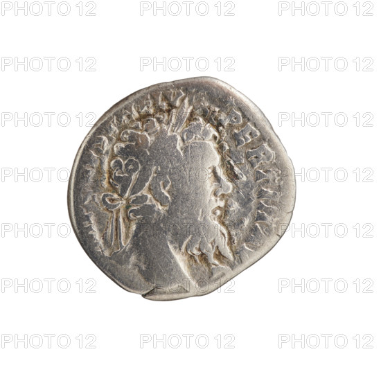 Denarius of Pertinax (126–193), Roman emperor (reigned 1–28 March 193). Obverse: head of Pertinax in a laurel wreath facing right, inscription MP, ES P HELV - PERTIN AVG. Reverse: personification of Ops seated left, holding two ears of corn in her right hand, left hand on the seat, inscription OPI DIVIN - TR, I. Date: 193. Roman Empire (27 BC–476). Coin: diameter 16.5–17.0 mm, weight 3.25 g, axis 0°.