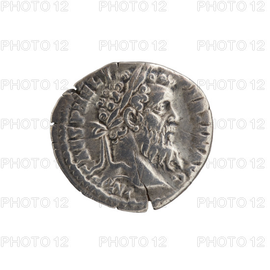 Denarius, Pertinax (126–193), issuer Pertinax; obverse: head of Pertinax in laurel wreath facing right, inscription IMP CAES P HELV - PERTIN AVG; reverse: Ops personified seated left, holding two ears of corn in right hand, left hand on seat, inscription OPI DIVIN - TR P COS II; dated 193 CE, Roman Empire (27 BCE–476 CE), Rome; coin; diameter 16.0–17.5 mm, weight 3.25 g, axis 15°.