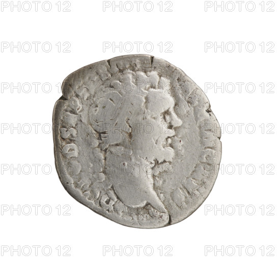 Denarius of Clodius Albinus (ca. 150–197; Roman emperor 193–197), issued during 193–195. Obverse: Head of Clodius Albinus without a cap, facing right, legend D CLOD SEPT BIN CAES. Reverse: Roma seated on a round shield facing left, holding a palladium in her right hand and a spear in her left, legend ROMAE A E R?NA (partial). Bronze/metal coin, Roman Empire (27 BC–476), Rome; diameter ~18.0–18.5 mm, weight 3.52 g, axis 180°.