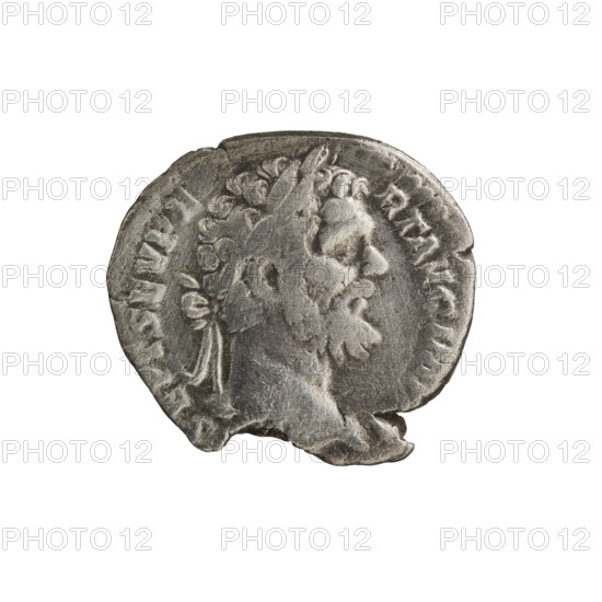 Denarius; Roman deities; panthers; Liber; thyrsus. Obv.: L. SEPT. SEV. PERTAVG. IMP. III — Head of Septimius Severus with a laurel wreath to the right, pearl rim. Rev.: LIBERO PATRI — Naked Liber stands facing left, holding a patera in his right hand and a thyrsus in his left; a panther at his left, pearl rim. Date: 194–198 CE. Roman Empire (27 BC–476). Rome. Coin: diameter 17.0–18.0 mm; weight 2.30 g.