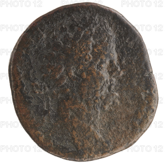 Sestertius; obverse: head of Septimius Severus with laurel wreath facing right; reverse: personification of Africa wearing an elephant skin on her head, standing facing right, lifting her robe on her shoulder with her left hand; lion at her feet facing right; marks SC on sides. Roman Empire, 193–195 CE. Bronze coin, diameter ~26.5–28.0 mm, weight 17.97 g. Inscription on obverse illegible.