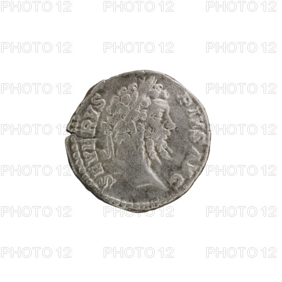 Denarius depicting standing emperor and tripod iconography; Septimius Severus (Roman emperor, 146–211). Obverse: SEVERVS PIVS AVG — head of Septimius Severus with laurel wreath facing right, pearl rim. Reverse: VOTAS V SCEPT A XX — the emperor in priestly attire stands upright with head turned left, holding a patera over a burning tripod in his right hand and a scroll in his left, pearl rim. Date: 201–210 CE. Roman Empire. Rome. Coin; diameter 18.0–18.5 mm; weight 2.51 g.