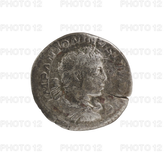 Denarius of Elagabalus (reigned 218–222 AD), Roman Empire, 220–222. Obverse: IMP ANTONINVS PIVS AVG — bust of Elagabalus in laurel wreath, armor and paludamentum, facing right; pearl border. Reverse: LIBERTAS AVG — Libertas standing left, holding a pileus in her right hand and a long scepter in her left; pearl border. Coin; diameter ~17.5–18.0 mm; weight 2.38 g.
