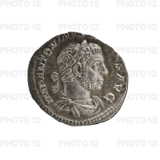 Denarius of Elagabalus (reigned 218–222). Obverse: IMP ANTONINVS VSAVG — Bust of Elagabalus with laurel wreath and paludamentum facing right; beaded/pearl rim. Reverse: SACERDD EIS OLISELACAB — Elagabalus wearing laurel wreath and long robe standing right, holding a patera above an altar in his right hand and a club in his left; star in right field; beaded/pearl rim. Date: 220–222. Roman Empire. Rome. Coin: diameter 18.5 mm; weight 3.30 g.
