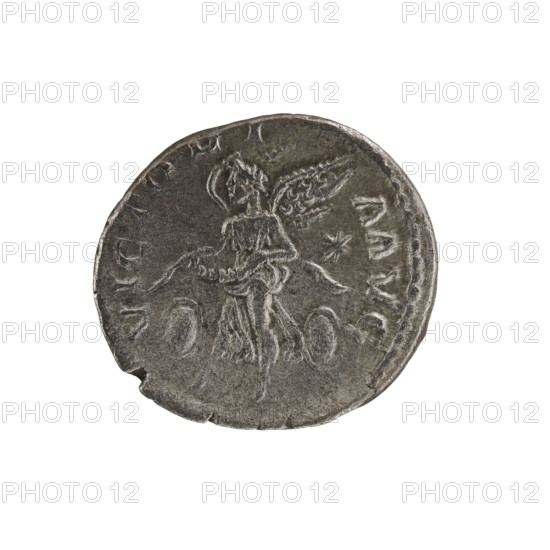 Denarius of Elagabalus (reigned 218–222). Obverse: IMP ANTO, PIVS AVG — Bust of Elagabalus with laurel wreath and paludamentum facing right; pearl border. Reverse: VICTORIA AVG — Flying Victoria facing left, holding a garland in both hands; one oval shield in each field, a star in the right field; pearl border. Dated 220–222. Roman Empire, Rome. Coin; diameter ~17–18 mm, weight 3.08 g.