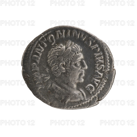 Denarius, Elagabalus (reigned 218–222 CE). Obverse: Bust of Elagabalus with laurel wreath and paludamentum facing right, pearl rim, inscription IMPANTONINVSPIVSAVG. Reverse: Victoria flying left holding a garland in both hands, one oval shield in each field, a star in the right field, pearl rim, inscription PMTRPIIIICOSIIIPP. Date: 221 CE. Roman Empire (27 BCE–476 CE), minted in Rome. Coin; diameter 17.5–18.0 mm, weight 2.90 g.