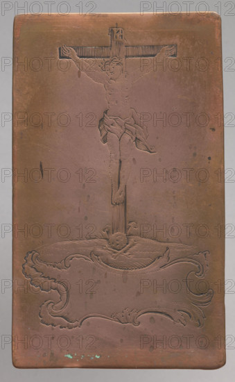 Crucifixion; graphic artist, Lohojsk; graphic composition depicting an image of Christ crucified; at the bottom an empty cartouche made of a rocailles ornament; belongs to a series of graphic compositions depicting images that are objects of cult, mostly by anonymous engravers often in monastery engraving workshops; after 1750; graphic; graphic matrix/plate; height 10.7 cm, width 6.3 cm; associated with Konstanty Tyszkiewicz (1806–1868) references.