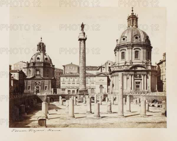 View of the Forum of Trajan in Rome, with the Column of Trajan and the churches Santissimo Nome di Maria and Santa Maria di Loreto, Italy, Forum Trajani. Roma, album page, photograph, This photo is part of an album., Rome, 1870 - 1890, photographer, paper, albumen print, height 205 mm x width 265 mm, square, circus, church (exterior), landscape with ruins, column, pillar, architecture, Column of Trajan, Forum of Trajan, Santissimo Nome di Maria al Foro Traiano, Santa Maria di Loreto, A wide sepia photograph of an ancient urban square showing two large domed churches with ornate façades flanking a tall cylindrical column topped by a statue, in front of them a foreground of archaeological ruins with many standing and fallen stone columns and carved blocks, surrounding buildings with multiple windows and tiled roofs visible behind the column, decorative architectural details on the churches including rounded windows and sculpted figures, and the scene framed by a pale border.