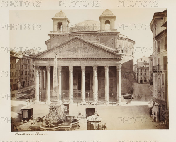 View of the Pantheon in Rome, Italy, Pantheon. Rome, album page, photograph, This photo is part of an album., Rome, 1870 - 1890, photographer, paper, albumen print, height 205 mm x width 266 mm, temple, shrine, non-Christian religions, Pantheon, A frontal view of a large classical building with a triangular pediment supported by tall columns, a rounded dome behind the pediment, and two smaller square bell towers flanking the dome; a tall obelisk stands in front of the building rising from an ornate fountain with sculpted figures and water basins; an open plaza occupies the foreground with small kiosks and street lamps, and surrounding multi-story buildings line narrow streets on both sides of the scene; the photograph is sepia-toned and shows architectural details such as column capitals, balustrades, arched doorways, and weathered stone surfaces.