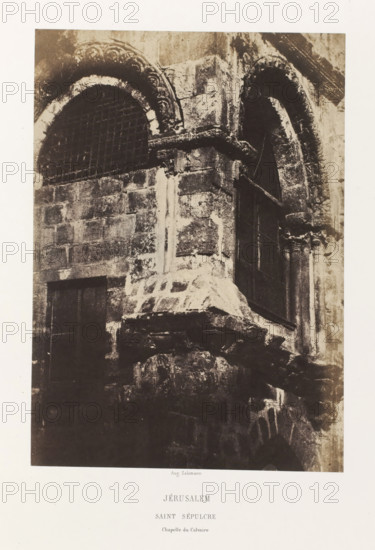 Jerusalem. Saint Sepulcre. Chapelle du Calvaire, Chapel of the Holy Sepulcher, Jerusalem, photograph, page, photographer: Auguste Salzmann, printer (person): Louis-Désiré Blanquart-Evrard, Lille, publisher: Gide et J. Baudry, Paris, 1854 - 1856, printer (person), pasteboard, paper, salted paper print, height 233 mm x width 164 mm, Photo on unnumbered page., architectural detail, parts of church exterior and annexes: chapel, Church of the Holy Sepulchre, A sepia-toned photograph of a stone building façade showing weathered masonry blocks, two arched openings with ornate carved stone surrounds, one arched opening fitted with a metal grid and the other appearing dark and recessed, a projecting stone ledge and a partially visible column with decorative capital, rough textured stones and mortar, and areas of light and shadow across the stone surfaces.
