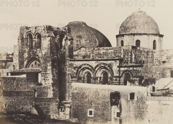 Jerusalem. Saint Sepulcre. Vue générale, View of the Church of the Holy Sepulcher in Jerusalem, photograph, page, photographer: Auguste Salzmann, Jerusalem, printer (person): Louis-Désiré Blanquart-Evrard, Lille, publisher: Gide et J. Baudry, Paris, 1854 - 1856, printer (person), pasteboard, paper, salted paper print, height 167 mm x width 233 mm, Photo on unnumbered page., church (exterior), Church of the Holy Sepulcher, A sepia-toned photograph of stone buildings with domes and arches filling the frame, showing weathered brickwork, rounded archways, rectangular windows, and a large rounded dome on the right with a smaller dome behind a central structure, layered terraces and parapets, varied masonry textures, and shadowed recesses across the façades.
