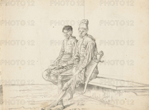 Two Sinhalese soldiers, sketchbook page, Outside by a wall – or inside in a corner of a building – two young men are sitting next to each other on a bench. A low retaining wall appears to have been built under the bench. Both men are drawn from a diagonal angle from the front, back to the right and legs, knees to the left. Both wear a half-length hip garment (veshti, lungi) wrapped in the Sinhalese style and a wide waistband. Above this, a short, buttoned-up jacket with long sleeves and a pleated hem (hettaya). A small collar hanging backwards is visible at the neck. The man on the left sits with bent knees and keeps his feet under the bench. On his lap, he holds a cap (?) with both hands. The man on the right sits with his legs stretched forward, left foot over the right. He keeps his arms outstretched, hands between his legs. His hair is hidden under a tall cap. He has a short, bushy beard. On his left hip he carries a long sword (kastane) with a decorated hilt; the sword's scabbard ...
