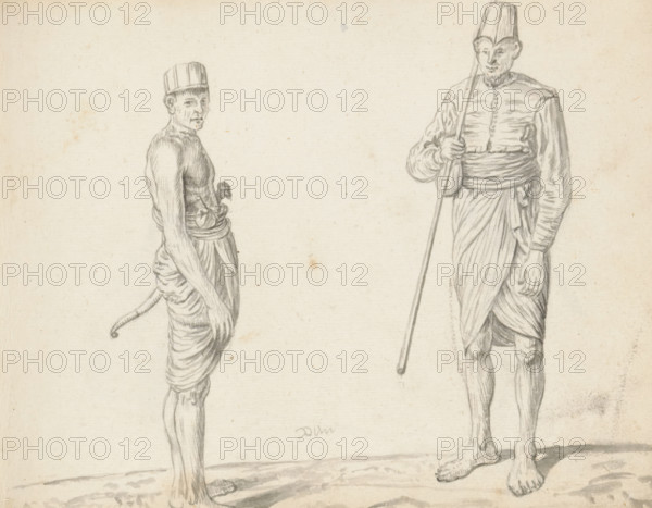 Two Sinhalese soldiers, sketchbook page, Two men are standing outside on uneven terrain. The man on the left is drawn from the side on the right. His upper body is uncovered. He wears a knee-length loincloth (veshti, lungi) wrapped in the Sinhalese style. Of the medium-length sword (kastane) carried on his left hip, we see only the decorated hilt with a small lion's head and the curled end of the scabbard. He wears a round, brimless cap. The man on the right is drawn from the front. He wears a buttoned-up short jacket with long sleeves and a pleated hem (hettaya), underneath which is a knee-length loincloth (veshti, lungi) wrapped in the Sinhalese style, and a high waistband around the waist. In his right hand he carries something that looks like a small pouch, and a long stick leaning against his right shoulder is probably a lance or a spear. Under his left arm protrudes the decorated hilt of a short sword (kastane). On his head is a typical cap (or helmet?): tall, stiff, with a point...