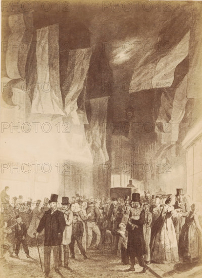 Photo reproduction of a drawing of the Kalverstraat by Reinier Craeyvanger, photograph, reproduction, inscription: 'Amsterdam, Kalverstraat, 2, Photographed by Ch. Binger & Co. Haarlem', photographer: Ch. Binger & Co., Haarlem, after drawing by Reinier Craeyvanger, 1867 - 1882, paper, pasteboard, daylight gelatin silver print, height 458 mm x width 303 mm, street (city(-scape) with figures, staffage), Amsterdam, A crowded indoor scene rendered in sepia tones with many standing figures wearing period clothing and top hats gathered beneath large draped fabrics hanging from the ceiling, a few people face forward while others converse or look around, a person at a raised platform is visible in the mid background, architectural elements like tall windows and arches appear along the sides, and the overall composition emphasizes the dark flowing drapery overhead contrasted with the lighter illuminated area below.