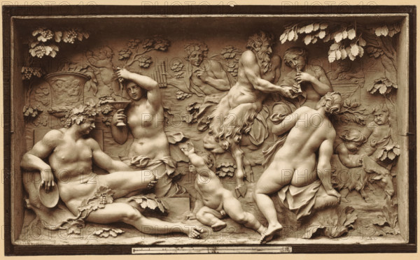 Hautrelief in Elfenbein von J. Elhafen. 1710. Bacchanale, Ivory relief depicting a bacchanal, by Ignaz Elfhafen, photomechanical print, number: 'Blatt 180.', Germany, cliché maker: anonymous, after sculpture by Ignaz Elhafen, printer (person): attributed to Johann Baptist Obernetter, Munich, 1869 - 1887, Ignaz Elhafen, photographer, clichémaker, after sculpture by, printer (person), Bavaria, Attributed to, pasteboard, paper, collotype, photoprint, height 130 mm x width 214 mm, height 418 mm x width 538 mm, piece of sculpture, reproduction of a piece of sculpture, bacchanal: Bacchus with his wine-flushed train (thiasos), A rectangular relief framed by a border shows a group of sculpted figures in a natural setting with leaves and grapes along the top corners. On the left a reclining male figure wearing a wreath and holding a circular dish rests against a carved seat, next to a standing female figure who holds a shallow cup and raises one hand to her head. In the center a small child rea...