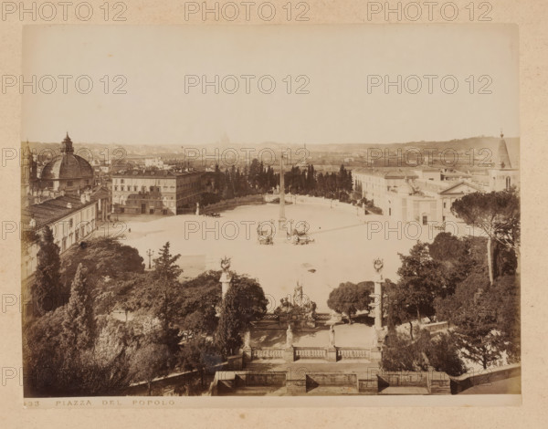 View of Piazza del Popolo in Rome, album page, photograph, This photo is part of an album., inscription: '433 PIAZZA DEL POPOLO', Rome, 1870 - c. 1895, photographer, paper, pasteboard, albumen print, height 200 mm x width 258 mm, prospect of city, town panorama, silhouette of city, square, circus, Piazza del Popolo, A wide sepia photograph of an open rectangular plaza flanked by buildings and trees, with a tall obelisk rising from its center and ornate lamp posts around its base. In the foreground a terraced stone balustrade and stairways lead down to a sculptural fountain ensemble with statues on pedestals and decorative finials. To the left a large domed church and adjacent classical buildings with rows of windows and tiled roofs are visible, and to the right a building with a conical tower and a church façade can be seen. Rows of tall slender trees form a dark band behind the plaza, and distant low-rise buildings and hills extend across the horizon under a pale sky.