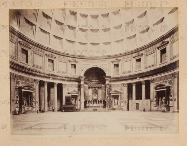Interior of the Pantheon in Rome, album page, photograph, This photo is part of an album., inscription: '412 PANTHEON DI AGRIPPA', Pantheon, 1870 - c. 1895, photographer, Rome, paper, pasteboard, albumen print, height 203 mm x width 260 mm, temple, shrine, non-Christian religions, interior, representation of a building, A wide interior view of a large domed rotunda with a patterned coffered ceiling above a curved wall featuring rectangular recessed panels and framed niches, a central arched niche with decorative elements and an ornate altar area below, flanked by tall columns with carved capitals and entablatures, sculptural figures and framed architectural openings set into the wall, a broad smooth floor with subtle geometric inlaid patterns, and scattered furnishings such as benches and small freestanding structures near the perimeter.