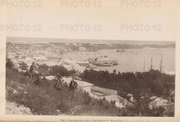 St. George's Island and Ordinance Island, page, photomechanical print, photographer: James H. Stark, Bermuda, cliché maker: Photo-Electrotype Company, Boston (Massachusetts), c. 1879 - in or before 1884, James H. Stark, Photo-Electrotype Company, photographer, cliché maker, North America, Massachusetts, paper, collotype, photoprint, height 99 mm x width 152 mm, island, Saint George's Island, Ordnance Island, A sepia-toned coastal scene showing a hillside covered in scrub and bushes descending to a settlement of light-roofed buildings and houses clustered along a shoreline and extending inland, with a harbor area containing piers and a wharf where a multi-deck vessel is moored, and tall masts of sailing ships visible near the water; several figures in period clothing stand or sit on the hillside among the vegetation, and trees and larger shrubs frame parts of the foreground and midground while a distant low shoreline and calm water stretch across the background under a pale sky.