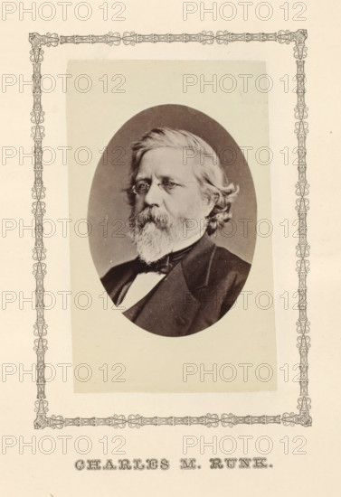 Charles M. Runk, photograph, page, c. 1876 - in or before 1881, photographer, paper, albumen print, height 96 mm x width 59 mm, adult man, An oval black-and-white portrait of an older man with light hair and a full beard and mustache set against a plain background, the man wearing small round eyeglasses and a dark suit jacket with a bow tie, the portrait mounted on a light rectangular mat that is itself placed on a larger page decorated with an ornate narrow border along the edges.
