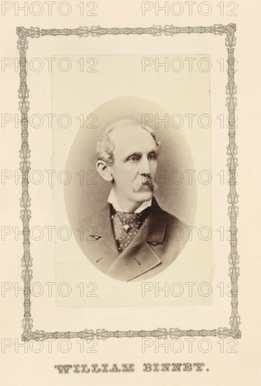 William Binney, photograph, page, c. 1876 - in or before 1881, photographer, paper, albumen print, height 91 mm x width 57 mm, adult man, A sepia-toned oval portrait of an older man is centered on a cream-colored page with a decorative border; the man has light hair combed back, a mustache, and a narrow face, and he is shown in three-quarter view looking to his left. He wears a high collared shirt, a patterned cravat or neckerchief, and a dark coat with wide lapels, with visible buttons and stitching. The oval portrait is mounted on a rectangular lighter panel that sits within an ornate narrow patterned frame that runs close to the page edges. The overall image has a vintage photographic appearance with soft shading around the figure and subtle paper texture.