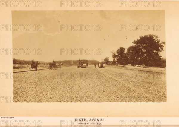 Sixth Avenue, photograph, page, photographer: George Gardner Rockwood, Central Park (New York), c. 1866 - in or before 1871, North America, New York (city), paper, albumen print, height 103 mm x width 166 mm, public gardens, park, avenue, boulevard, promenade, esplanade, A wide sepia-toned photograph shows a rough, gravel-covered roadway stretching from foreground to background with a small horse-drawn carriage and a second horse hitched to a wagon positioned along the left side, a boxy wooden vehicle about mid-distance near the center with a person standing beside it, a cylindrical steamroller or similar heavy roller slightly to the right with a person nearby, and a large leafy tree cluster on the right edge with scattered construction materials along its base under an expansive sky.