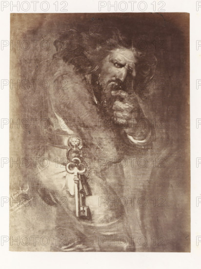 Photo reproduction of Quasimodo by Antoine Wiertz, photograph, reproduction, page, check stamp: 'SOCIÉTÉ ROYALE BELGE DE PHOTOGRAPHIE, 69, RUE KEYENVELD, BRUXELLES', photographer: Edmond Fierlants, after painting by Antoine Joseph Wiertz, c. 1863 - in or before 1868, paper, albumen print, albumendruk, height 151 mm x width 115 mm, male literary characters (QUASIMODO), A sepia-toned image of an older bearded man shown from the waist up, wearing a cloak with flowing hair and a furrowed brow, his hand raised to his mouth with fingers near his lips, a large ornate key hanging from his belt with decorative rings and a circular medallion, the background textured and darker around the figure, the image framed by a light border.
