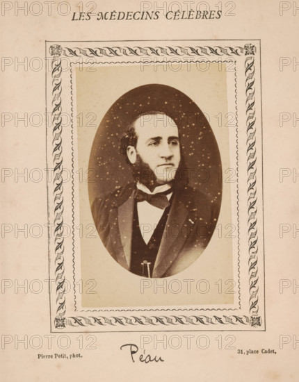 Portrait of Péau, photograph, page, number: '64', annotation: 'Péau', inscription: '(Publication de la Revue de literary médicale, du docteur Félix Bremond, 20, Passage Saulnier, Paris., 3e année - No.', photographer: Pierre Petit, c. 1871 - c. 1879, paper, albumen print, height 81 mm x width 54 mm, historical persons, adult man, A sepia-toned portrait of a man with sideburns and a mustache, shown from the chest up inside an oval frame, wearing a dark suit with a bow tie and a waistcoat, set on a light rectangular mat with decorative border patterns and an outer rectangular frame on aged paper.