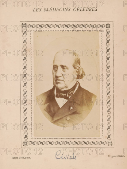 Portrait of Jean Civiale, photograph, page, annotation: '64', inscription: 'Publication de la Revue de literary médicale, du docteur Felix Bremond, 20, Passage Saulnier, e année- No.', photographer: Pierre Petit, c. 1871 - c. 1879, paper, albumen print, albumendruk, height 90 mm x width 56 mm, Person, Jean Civiale, historical persons, adult man, A faded portrait of an older man with a receding hairline and side-swept hair shown from the chest up, wearing a dark coat, vest, and bow tie, set inside an oval frame that sits within a decorative rectangular border featuring a repeating leaf-and-ribbon motif and corner floral designs, all on a beige, aged paper background.