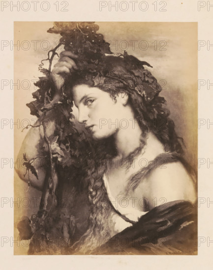 Photo reproduction of La Bacchante by Jan Frans Portaels, photograph, reproduction, page, after painting by Jean François Portaels, c. 1858 - c. 1863, photographer, paper, albumen print, albumendruk, height 149 mm x width 111 mm, picture, painting, adult woman, A sepia-toned portrait of a young woman shown from the shoulders up, facing slightly to the left with her head tilted and eyes looking toward the viewer; she has long wavy hair braided and entwined with vines and leaves that form a crown around her head, and one hand raised to hold part of the foliage; her bare shoulder and upper chest are visible with a strap of clothing slipping off, and the overall image has soft shading and a textured background.