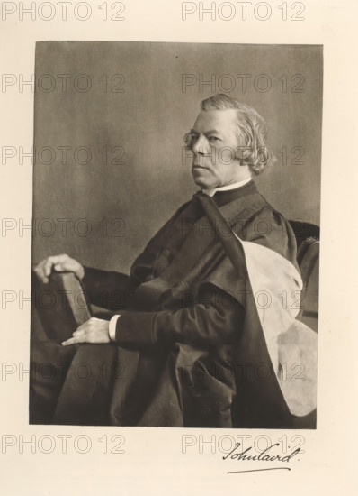Portrait of John Caird, John Caird, page, photomechanical print, cliché maker: T. & R. Annan & Sons, Glasgow, c. 1886 - in or before 1891, photographer, paper, photoaquatint, height 195 mm x width 146 mm, Print on second unnumbered page after page 29., Person, historical persons, A seated older man shown from the waist up in a monochrome portrait, wearing a dark formal robe with a lighter fabric draped over one shoulder, his hair swept back and slightly wavy, his face turned to the side with a neutral expression, one hand resting on the arm of the chair and the other visible on his lap, a plain backdrop behind him and a narrow light border around the image.