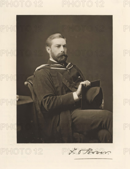 Portrait of Frederick Orpen Bower, FO Bower, page, photomechanical print, cliché maker: T. & R. Annan & Sons, Glasgow, c. 1886 - in or before 1891, photographer, paper, photoaquatint, height 193 mm x width 145 mm, Print on second unnumbered page after page 125., Person, Frederick Orpen Bower, historical persons, professor, A seated man with a full beard and neatly combed hair wears a dark academic gown with light trim and holds a hat in his lap while resting an arm on the chair; he looks slightly to the side against a plain dark background, and part of a table and the carved arm of the chair are visible.