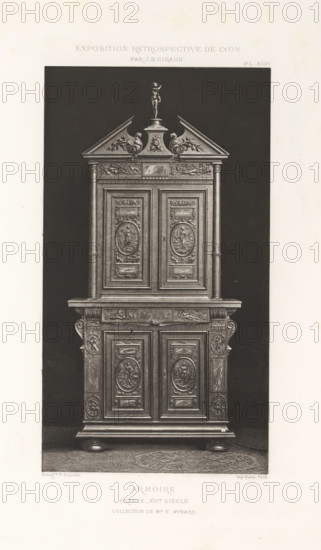 16th-century French wooden cabinet, at the Exposition Rétrospective of 1877 in Lyon, France, photomechanical print, This print is part of a cover with 79 prints on 54 sheets and 65 text sheets., inscription: 'EXPOSITION RÉTROSPECTIVE DE LYON, PAR JB GIRAUD.', inscription: 'ARMOIRE, FRANCE_16th Century, Collection of Mr E. AYNARD.', number: 'PL. XLVI.', photographer: Jacques Garcin, Lyon, cliché maker: Dujardin, printer (person): Imprimerie Eudes, Paris, 1877 - 1878, printer (person), paper, photoaquatint, height 463 mm x width 313 mm, ornamental cupboard (wood and other phytogenic material), A tall ornamental wooden cabinet with carved panels stands against a dark backdrop, featuring an upper section with a triangular pediment topped by a small standing figure, decorative scroll motifs at the pediment base, and a pair of fluted columns framing two carved doors with oval medallion reliefs; below is a wide shelf over a lower cabinet section with similarly carved doors, ornamented pilaste...