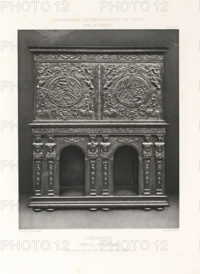 17th-century French wooden dresser, at the Exposition Rétrospective of 1877 in Lyon, France, photomechanical print, This print is part of a cover with 79 prints on 54 sheets and 65 text sheets., inscription: 'CRÉDENCE, FRANCE_XVIIe SIÈCLE, COLLECTION DE Mr CHABRIÈRES-ARLES.', number: 'PL. LVII.', inscription: 'EXPOSITION RÉTROSPECTIVE DE LYON, PAR JB GIRAUD.', photographer: Jacques Garcin, Lyon, cliché maker: Dujardin, printer (person): Imprimerie Eudes, Paris, 1877 - 1878, printer (person), paper, photoaquatint, height 463 mm x width 313 mm, ornamental cupboard (wood and other phytogenic material), A large ornate wooden cabinet photographed straight on, with an upper panel richly carved with symmetrical circular medallions surrounded by scrolling foliage, cherubic figures, and animal motifs, and a lower section featuring three arched recesses flanked by vertical pilasters decorated with floral garlands and small sculpted figures, a frieze with carved ornamental motifs above the arches...