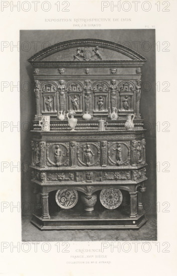 16th-century French wooden sideboard, at the Exposition Rétrospective of 1877 in Lyon, France, photomechanical print, This print is part of a cover with 79 prints on 54 sheets and 65 text sheets., inscription: 'EXPOSITION RÉTROSPECTIVE DE LYON, PAR JB GIRAUD.', inscription: 'CRÉDENCE, FRANCE_XVIe SIÈCLE, COLLECTION DE Mr E. AYNARD.', number: 'PL. XI.', photographer: Jacques Garcin, Lyon, clichémaker: Dujardin, printer (person): Imprimerie Eudes, Paris, 1877 - 1878, printer (person), paper, photoaquatint, height 463 mm x width 313 mm, ornamental cupboard (wood and other phytogenic material), A tall ornate wooden cabinet photographed against a plain backdrop, featuring an arched pediment with carved figures and decorative moldings, a middle section with a row of small framed niches each containing carved human figures and fluted pilasters, a ledge displaying various ceramic vessels and jugs, and a lower paneled section decorated with round medallion reliefs of standing figures and intric...