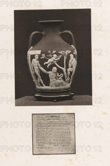 Letter and the Wedgwood replica of the Portland Vase, photograph, page, photographer: Joseph Cundall, c. 1868 - in or before 1873, paper, carbon print, height 361 mm x width 270 mm, Photo on second unnumbered page after page viii., letter, envelope, container of ceramics: jar, jug, pot, vase, A photograph of a decorative vase with two curved handles on a dark background, placed on a round base and a flat textured surface; the vase shows a raised classical relief scene depicting human figures in various poses among stylized trees, one reclining figure, one seated figure with a contemplative pose, another standing figure reaching toward the reclining figure, and a winged cherub-like figure above them; the vase body has a smooth dark finish contrasting with the lighter relief elements; the image is mounted on a pale sheet with scattered small brown spots and a separate rectangular block of printed material below the photograph.