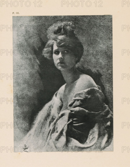 Portrait study of an unknown young woman, page, photomechanical print, inscription: 'Study by C. Puyo', inscription: 'F. III.', photographer: Constant Puyo, cliché maker: anonymous, c. 1900 - in or before 1905, paper, two-color autotype, height 150 mm x width 110 mm, historical persons - BB - woman, adolescent, young woman, maiden, A monochrome portrait of a woman shown from the shoulders up, her hair swept up and curly, her face turned slightly toward the viewer with a neutral expression; she is draped in a textured cloth that covers her shoulders and chest, creating folds and shadows, while a softly shaded background frames her head and upper body.