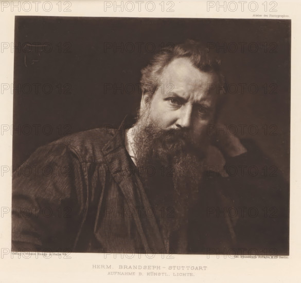 Portrait of an unknown man, page, photomechanical print, inscription: 'AUFNAHME B. KÜNSTL. LICHTE.', inscription: 'Atelier des Photographen.', photographer: Hermann Brandseph, Stuttgart, cliché maker: Meisenbach, Riffarth & Cie., Berlin, c. 1895 - in or before 1900, Baden-Württemberg, paper, photoaquatint, height 150 mm x width 176 mm, historical persons, A sepia-toned portrait shows the upper body and head of a bearded man with tousled hair, his face turned slightly and his eyes looking forward, wearing a textured, striped jacket; the background is dark and plain, and the image is bordered by a light margin.