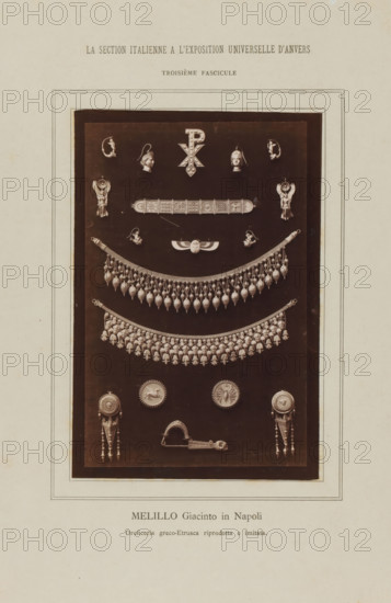 Melillo Giacinto in Napoli, Earrings and necklaces, La Section Italienne a l'Exposition Universelle d'Anvers - Troisième Fascicule, photograph, page, inscription: 'Oreficeria greco-Etrusca riprodotta e imitata.', c. 1880 - in or before 1885, photographer, paper, albumen print, height 162 mm x width 108 mm, Photo on loose plate opposite page 56., ear-rings, necklace, A photographic plate centered on a dark rectangular panel displays an arrangement of various metallic jewelry pieces and ornamental elements mounted against the dark background, including paired decorative heads and small relief figures near the top, a central emblem with a vertically oriented symbol flanked by two human-profile earrings, a horizontal engraved bar with geometric panels, a winged scarab-like ornament, two large semicircular fringe necklaces composed of repeated teardrop and floral-shaped pendants, a series of round medallions and shield-like discs, paired long pendant earrings with tapered drops and bead cha...