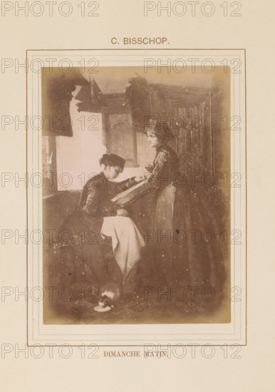 Photo reproduction of Dimanche Matin by Christoffel Bisschop, Dimanche Matin, photograph, reproduction, page, inscription: 'C. Bisschop', after painting by Christoffel Bisschop, c. 1878 - in or before 1883, photographer, paper, albumen print, height 134 mm x width 98 mm, adult man, painting, drawing and the graphic arts, A sepia-toned framed illustration shows two women indoors near a window and a wooden panel; one woman is seated and leaning over a large book or album held by the standing woman, both wearing period dresses and head coverings, the seated woman with a light cloth draped over her lap and the standing woman holding a cup, a small cat is on the floor near a saucer, and the scene is bordered by decorative lines on a cream-colored page.