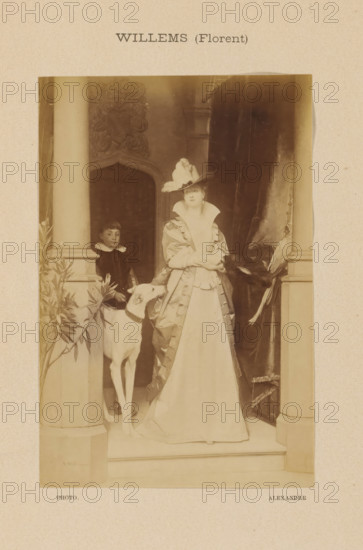 Willems (Florent), Photo reproduction of La Châtelaine by Florent Willems, photograph, reproduction, page, photographer: Alexandre, after painting by Florent Willems, c. 1888 - in or before 1893, paper, albumen print, height 154 mm x width 102 mm, Photo two pages after page 36., boy (child between toddler and youth), adult man, painting, drawing and the graphic arts, A sepia-toned photograph shows a woman standing on a small raised platform between two columns, wearing a long gown with a fitted bodice and a voluminous skirt, a decorative coat with buttoned trim, long gloves, and a wide-brimmed hat adorned with a plume; a young boy in a dark outfit with a white collar stands slightly behind her to one side, and a slender dog with a collar stands in front of the boy, its head near the woman's hand; ornate carved architectural details are visible in the background between the columns, and a heavy draped curtain hangs to one side while potted foliage is placed near the base of a column.