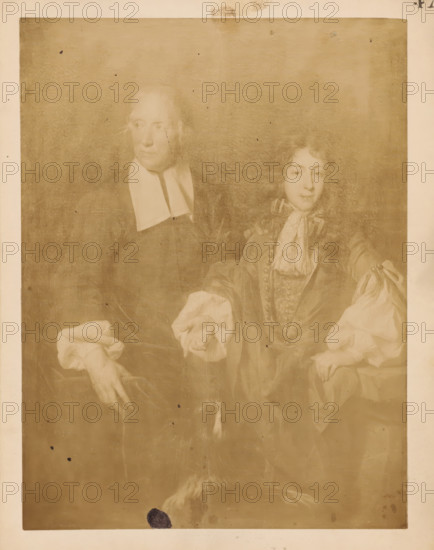 Photographic reproduction of a painting of a portrait of Louis, Dauphin of France and his son Louis of France by Nicolas de Largillière, photograph, reproduction, page, number: '47', after painting by Nicolas de Largillière, c. 1882 - in or before 1887, photographer, paper, albumen print, height 120 mm x width 102 mm, Person, Louis of France (Duke of Burgundy), Dauphin of France Louis, historical persons, aristocracy, 'Aristocratia' (Ripa), A faded sepia portrait of two seated figures within a rectangular frame, one older person on the left wearing a dark garment with a white clerical collar and loose sleeve cuffs, and a younger person on the right wearing a detailed jacket with decorative buttons, a patterned waistcoat, a cravat, and full puffed sleeves, both showing faint facial features and hands positioned in front of them, with visible canvas texture, spots and small blemishes across the surface, a darker smudge near the bottom edge, and a narrow lighter border around the image.
