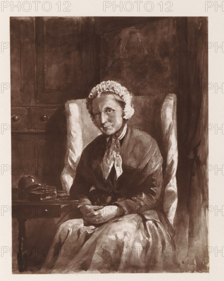 Photo reproduction of a painting depicting a portrait of Mary Lea Gidman, reproduction, page, photomechanical print, cliché maker: Woodbury Permanent Photographic Printing Company, after painting by Mary Grove, c. 1866 - in or before 1876, photographer, paper, Woodburytype, height 113 mm x width 87 mm, Drawing made in 1858., Person, Mary Lea Gidman, historical persons - BB - woman, An older woman wearing a dark dress and a light frilled cap sits in a high-backed upholstered chair, hands folded in her lap; she has a contemplative facial expression and a scarf tied at her neck. The chair shows patterned armrests and light highlights. To her side is a small table with a rounded object and a closed book or box on it. Behind her is a paneled wall with subtle shading and a curtain or drapery at the edge. The image has a monochrome, sepia-toned appearance and visible brush or wash textures throughout.