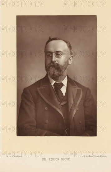 Dr. Robson Roose, Portrait of Edward Charles Robson Roose, page, photomechanical print, inscription: '57 & 61, Elbury Street, London.', photographer: Downey, William & Daniel, London, cliché maker: anonymous, c. 1882 - in or before 1892, paper, Woodburytype, height 140 mm x width 93 mm, Person, Edward Charles Robson Roose, physician, doctor, A sepia portrait of a middle-aged man shown from the chest up, wearing a dark double-breasted jacket with wide lapels and a waistcoat beneath, a white shirt collar and a patterned tie; he has a full beard and mustache, short hair with a small wave at the top, round eyeglasses, and a neutral facial expression, set against a plain softly shaded background with a light border around the photograph.