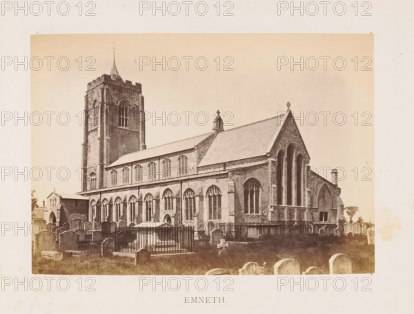 Emneth, photograph, page, photographer: Edward Johnson, c. 1858 - in or before 1869, Norfolk (county), paper, albumen print, height 126 mm x width 178 mm, church (exterior), facade (of house or building), churchyard (around church), Saint Edmund's Church (Emneth), A sepia-toned photograph of a large stone church with a tall square tower topped by a small spire and crenellated parapet, a long nave with rows of tall arched windows, and a pitched roof with decorative finials; in front of the church is a graveyard with numerous headstones of various shapes and a fenced tomb with vertical bars; the image is bordered by a wide pale margin.